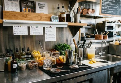 Craft beer beside spicy food.